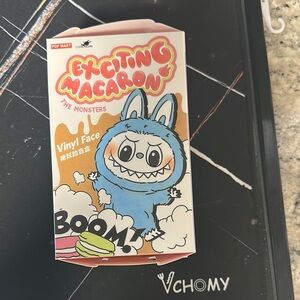 NIB.   Exciting Macaron Vinyl Face Figure